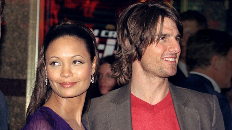 Thandiwe Newton and Tom Cruise smiling