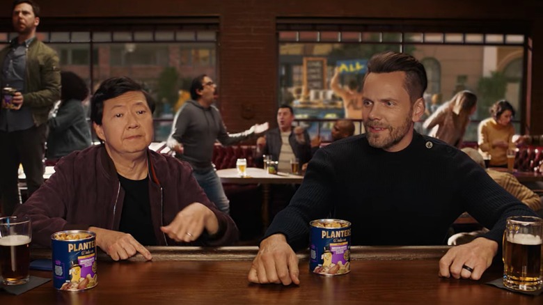 Ken Jeong and Joel McHale appear in the Planters Super Bowl 2022 commercial
