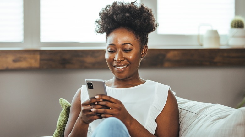 Smiling woman on phone