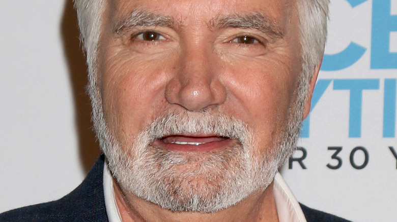 John McCook with slight smile