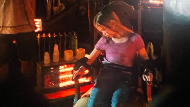 Alaina Pollack strapped to a chair in an episode of "On Call"