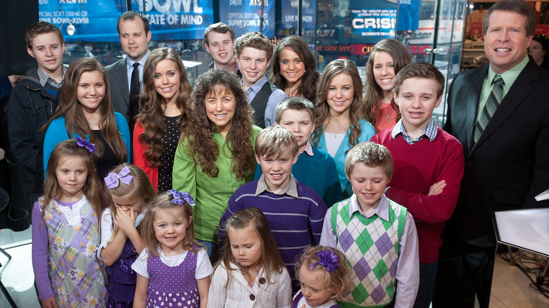 The Duggar family posing