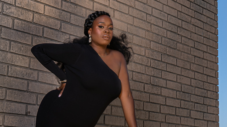 Bria Henderson in a black dress