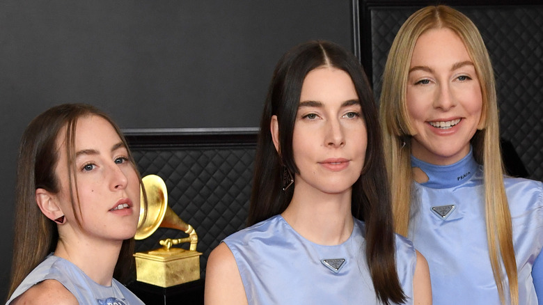 Haim on red carpet with Hime haircuts