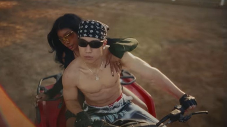 Young Mazino riding with SZA in the Snooze video