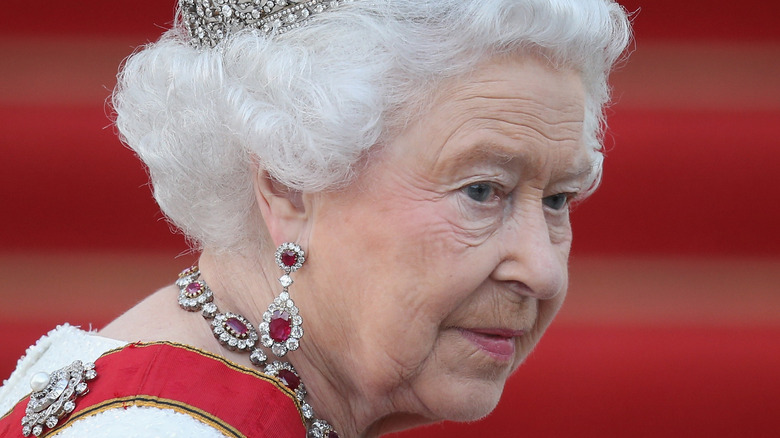 Queen Elizabeth looking solemn