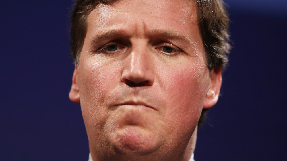 Tucker Carlson looking concerned