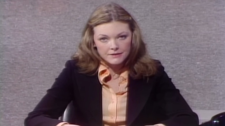 Jane Curtin behind the Weekend Update desk on SNL