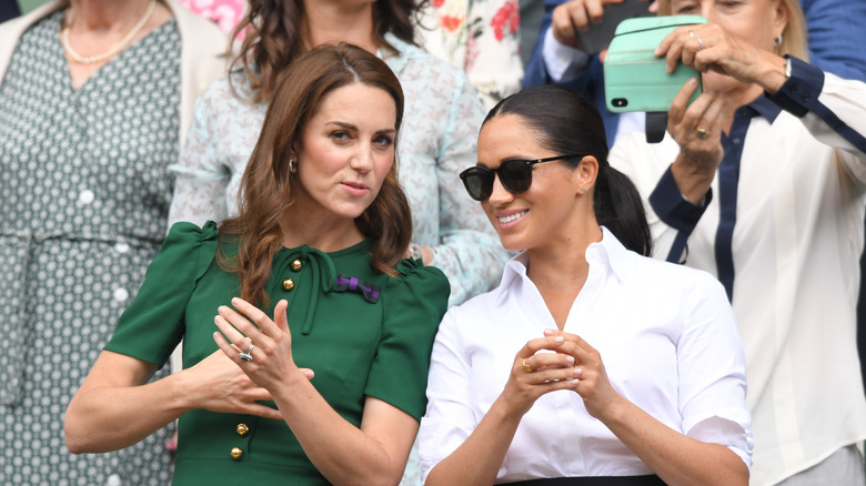 Kate Middleton & Meghan Markle at event