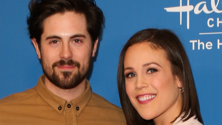 Chris McNally and Erin Krakow pose together on the red carpet