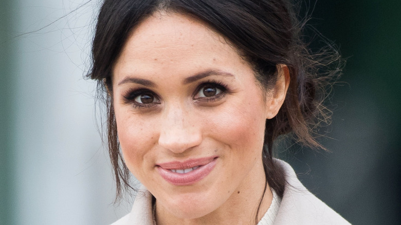 close up of Meghan Markle smiling