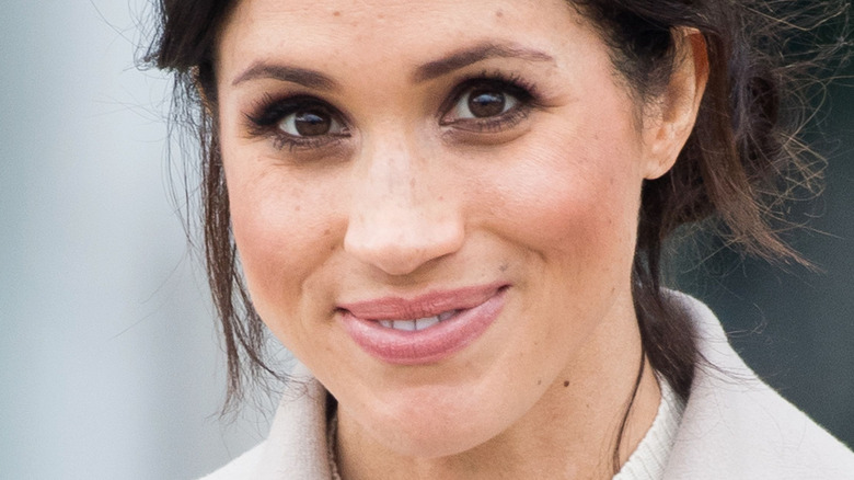 Meghan Markle smiles