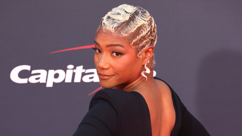 Tiffany Haddish looking over her shoulder