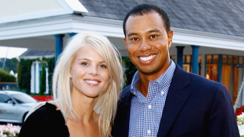 Elin Nordegren and Tiger Woods smiling for the camera