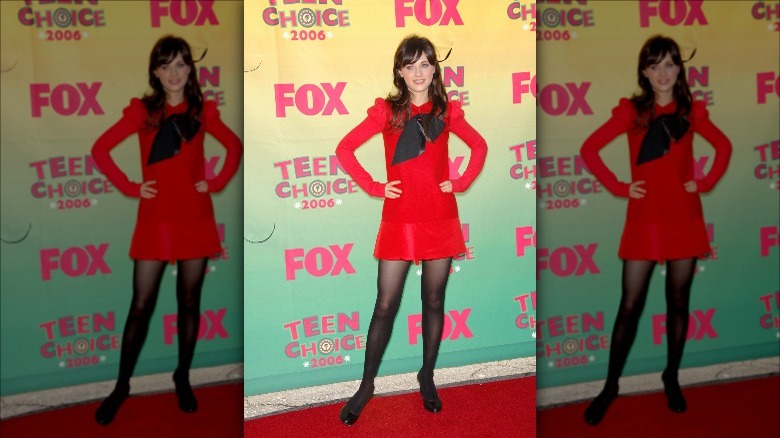 Zooey Deschanel wearing a twee outfit on the red carpet
