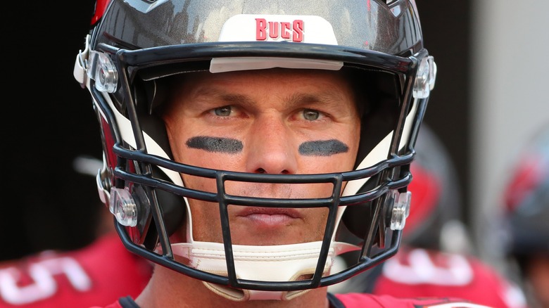 Tom Brady wearing a football helmet