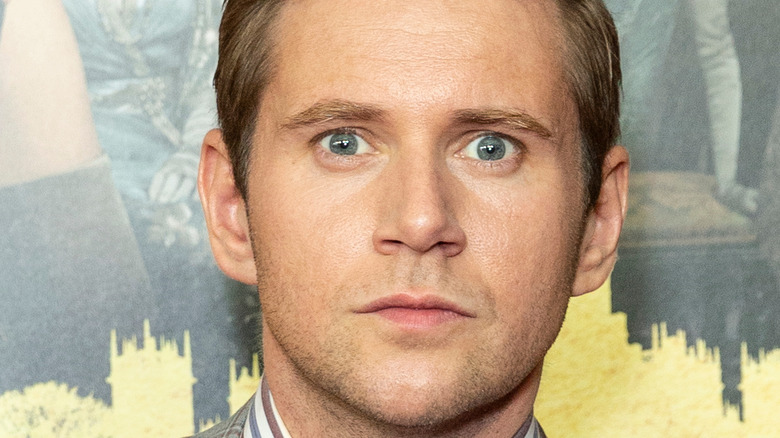 Allen Leech posing for a picture at the Downton Abbey premiere