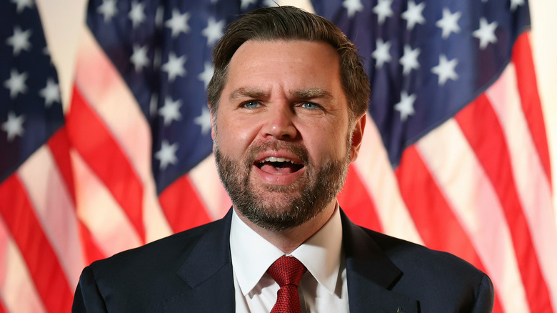 JD Vance talking and looking into the distance