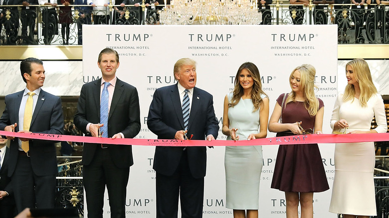 Trump family cutting ribbon