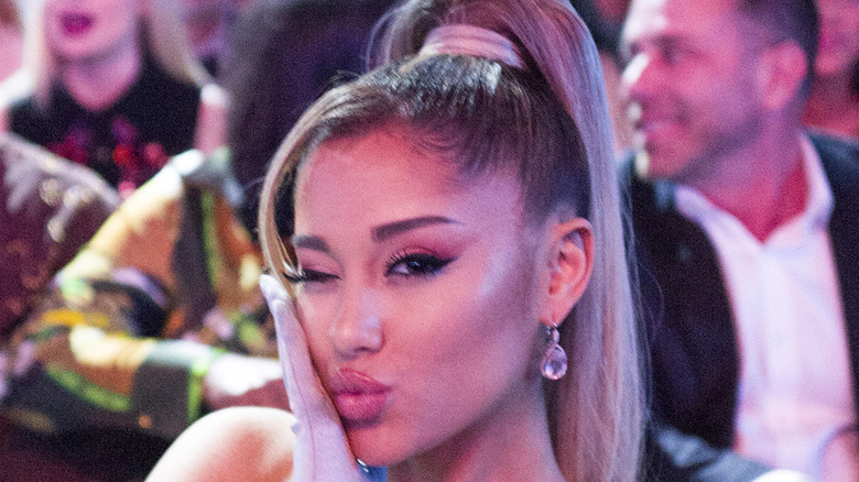 Ariana Grande winking at an awards show