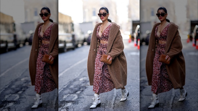 Woman walking on the street wearing a maxi skirt