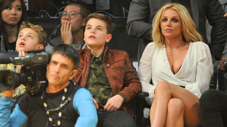 Britney Spears with sons at a basketball game