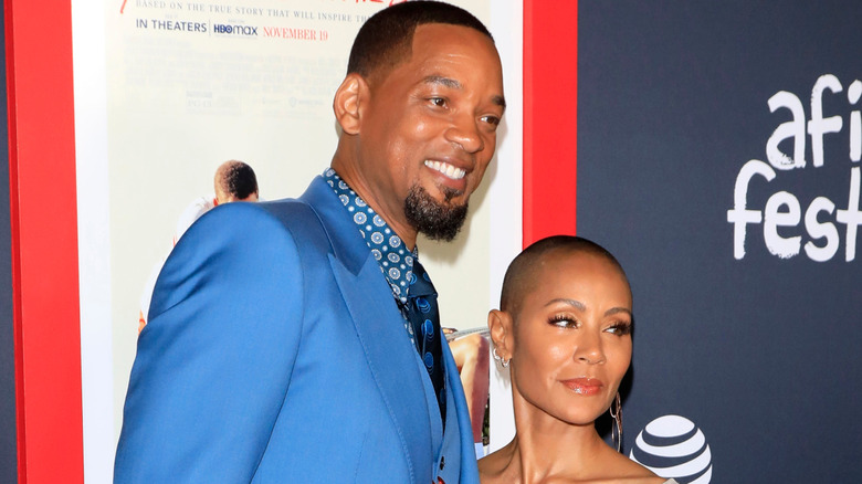 Will and Jada smiling at Oscars