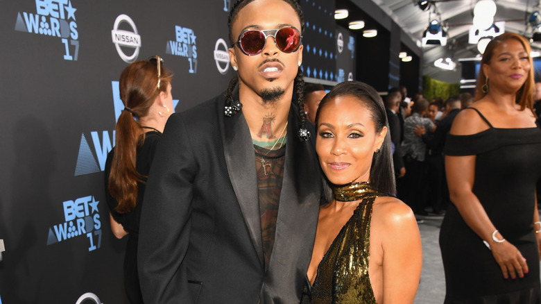 Jada and August posing