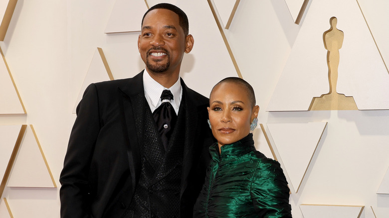 Will and Jada smiling at Oscars