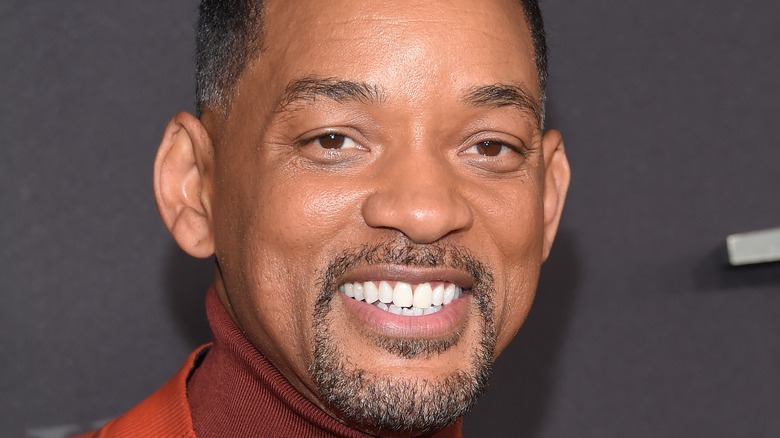 Will Smith smiling for photo