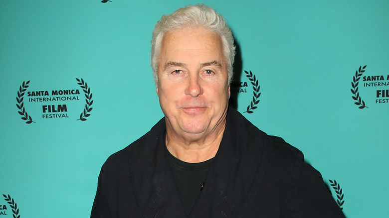 William Petersen slightly smiling