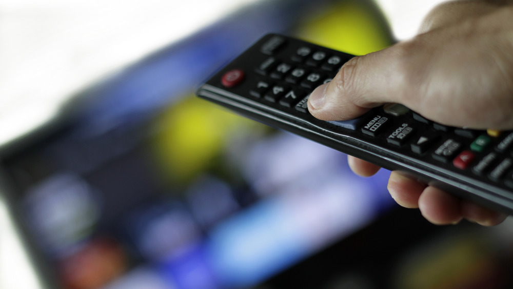 remote control aimed at TV