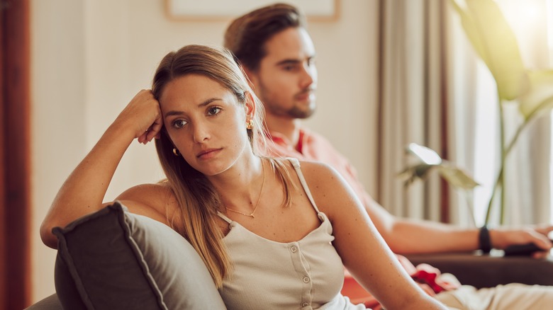 Couple sitting on couch