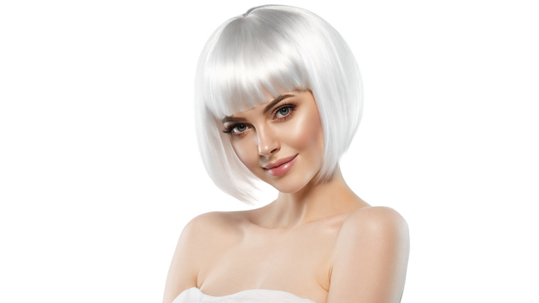 Woman with short platinum hair