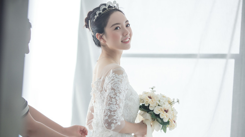 Woman in lace wedding dress