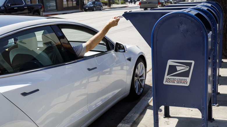 dropping mail in USPS box