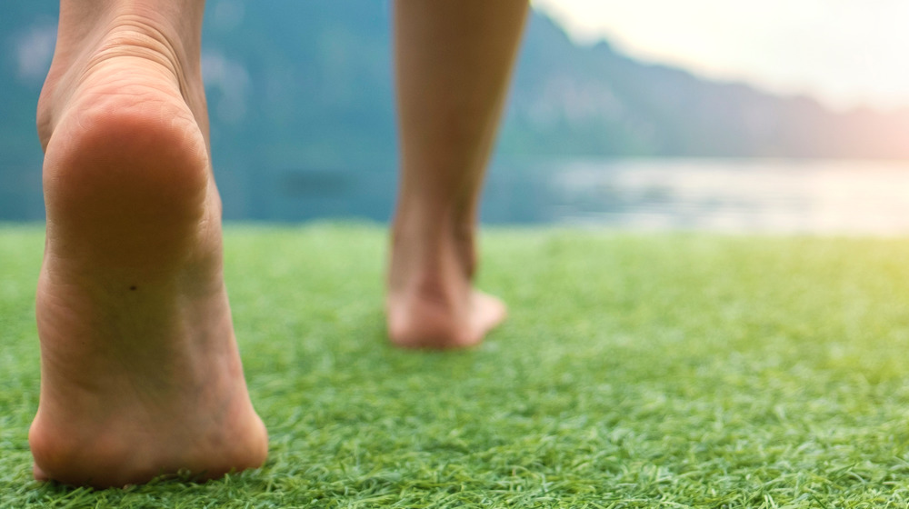 walking barefoot on grass