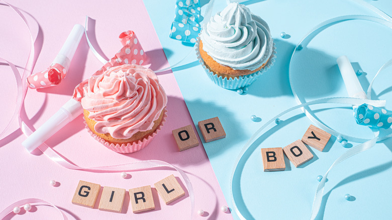 Pink and blue cupcakes gender reveal display