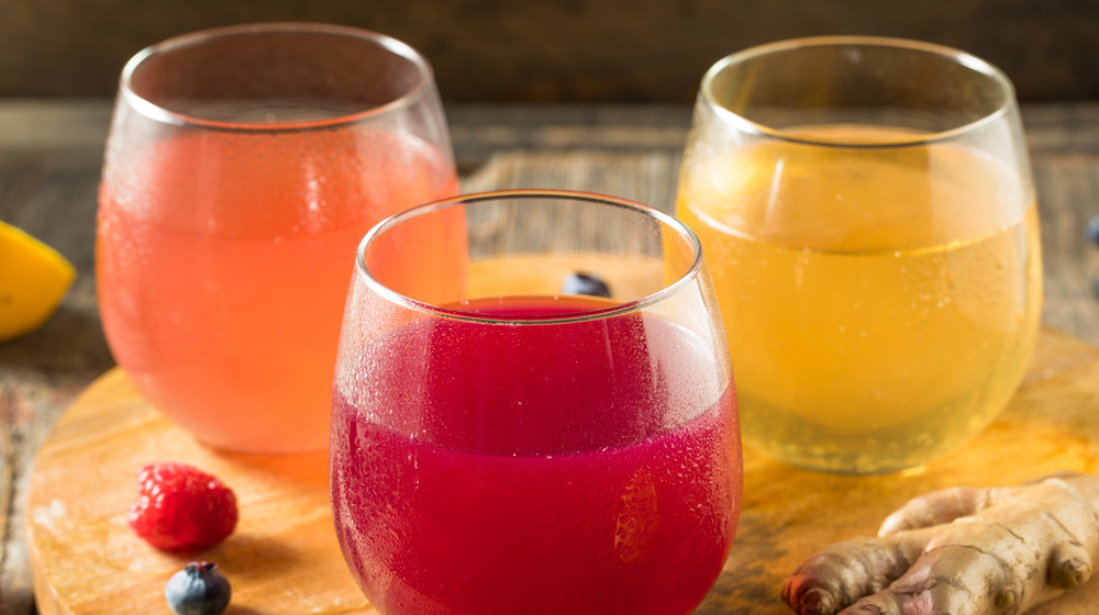 Wine glasses filled with kombucha