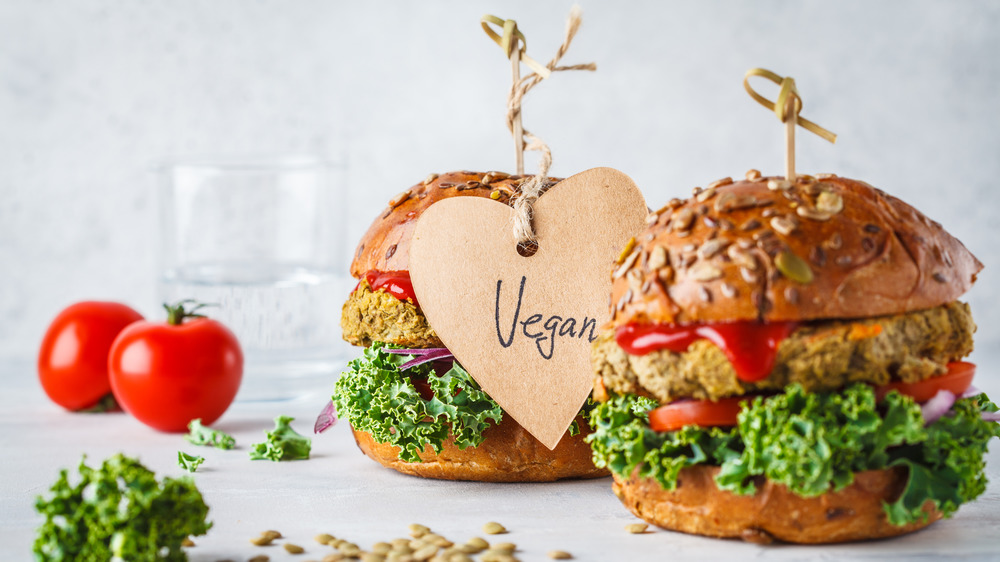 Vegan burgers with tomatoes