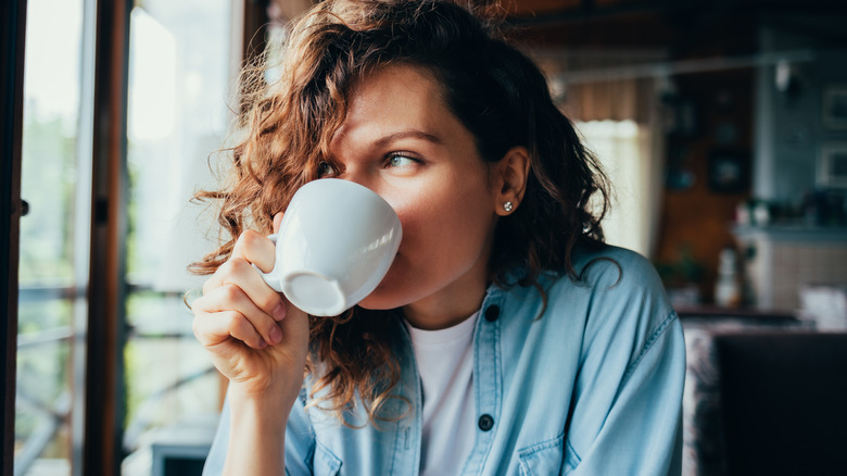 woman drinking coffee