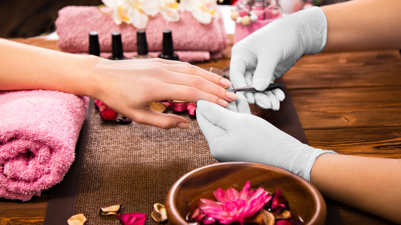 Woman getting a manicure