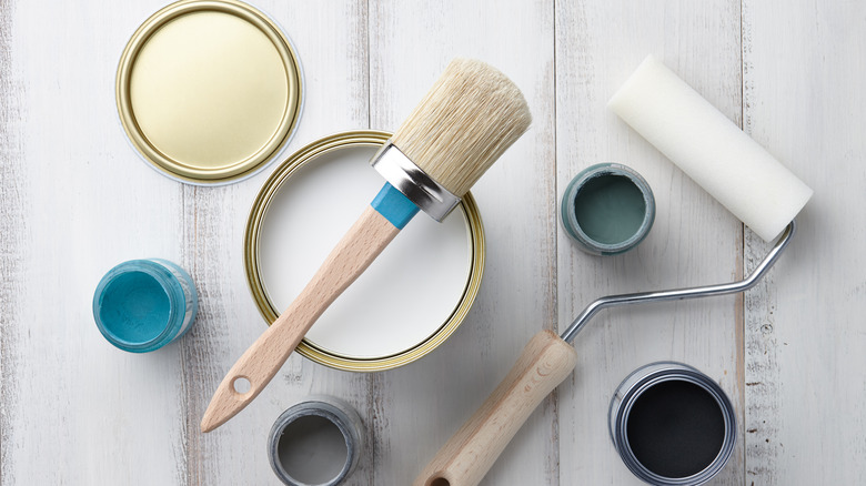 Paint cans on the floor