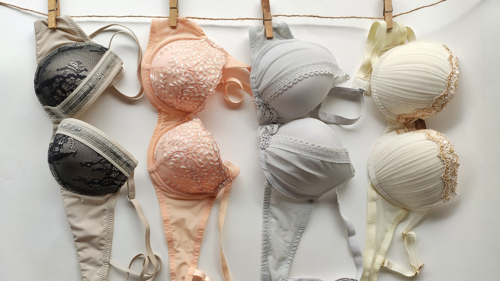 Bras drying on a clothing line