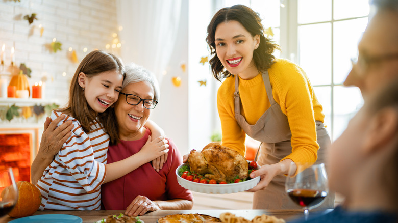 Smiling family at Thanksgiving 