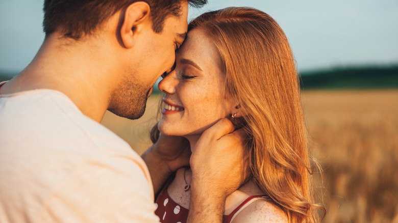 loved up couple being affectionate