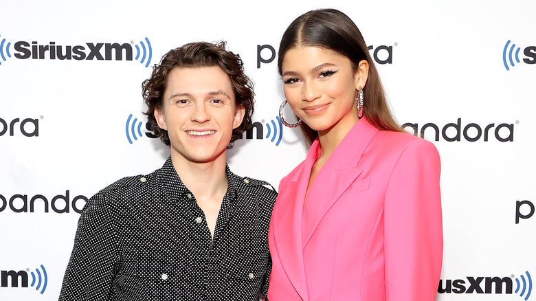 Tom Holland and Zendaya posing together