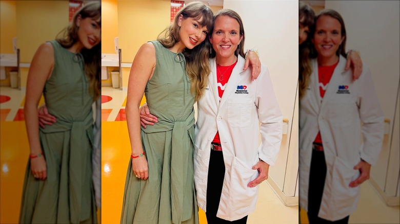 Taylor Swift with her arm around a doctor, smiling.