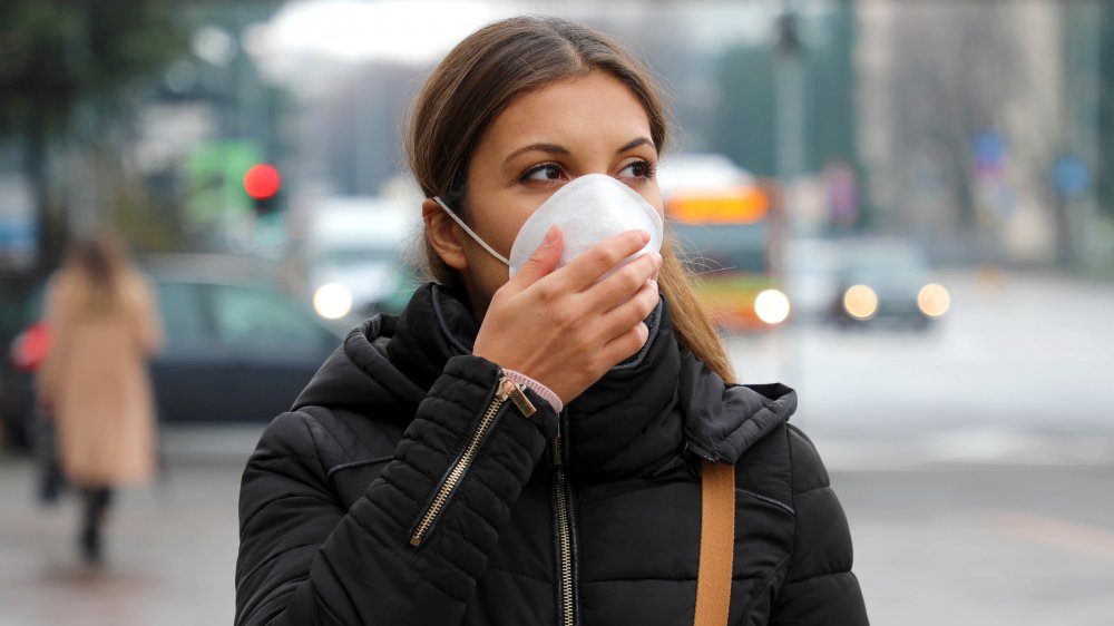 Woman on the street wearing a facemask