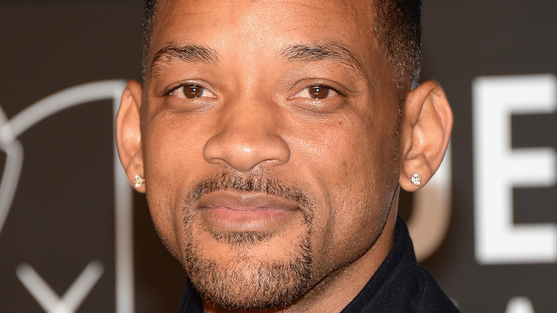 Will Smith smiles